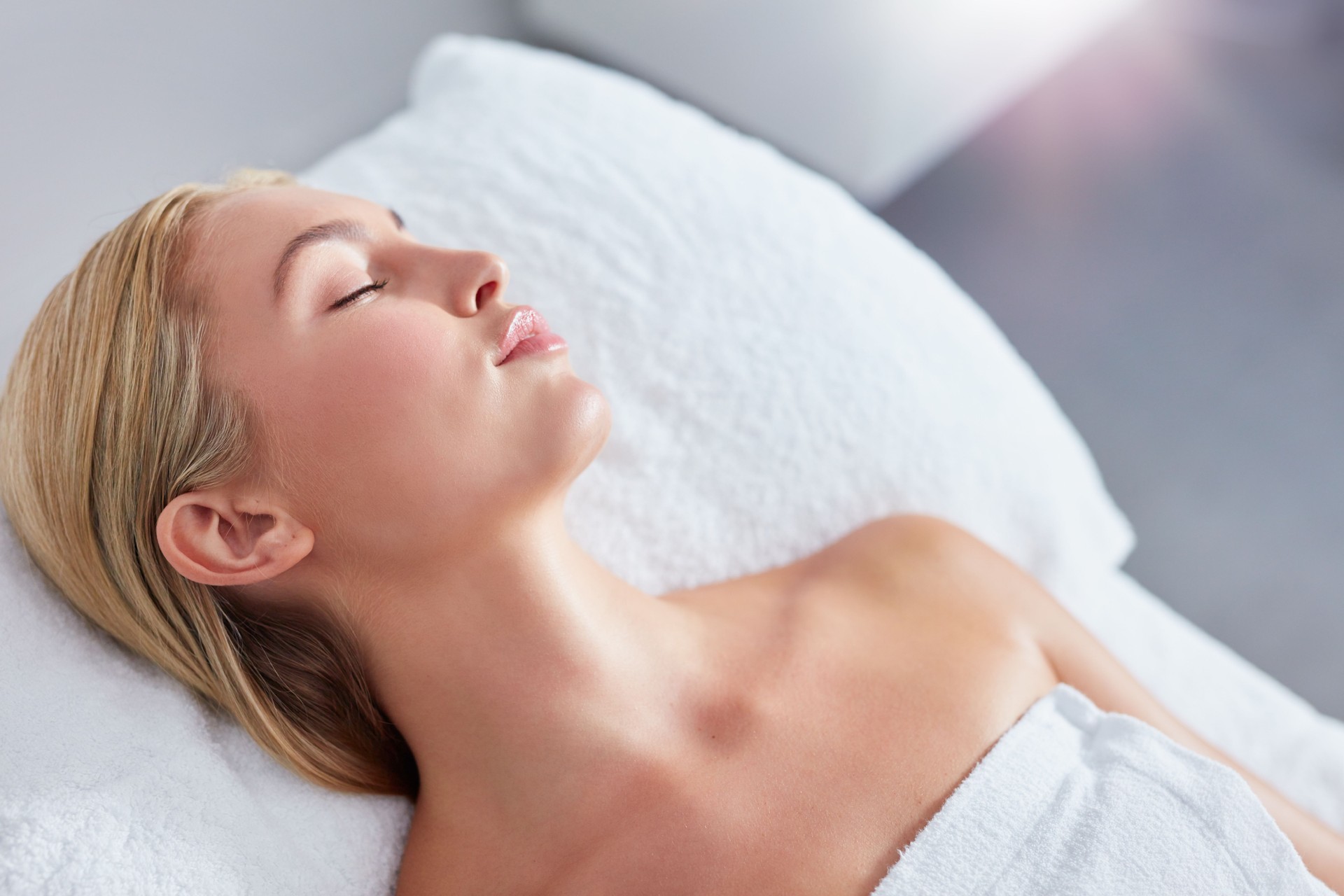 Beautiful young blonde relaxing at spa